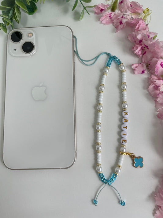 White and blue phone charm