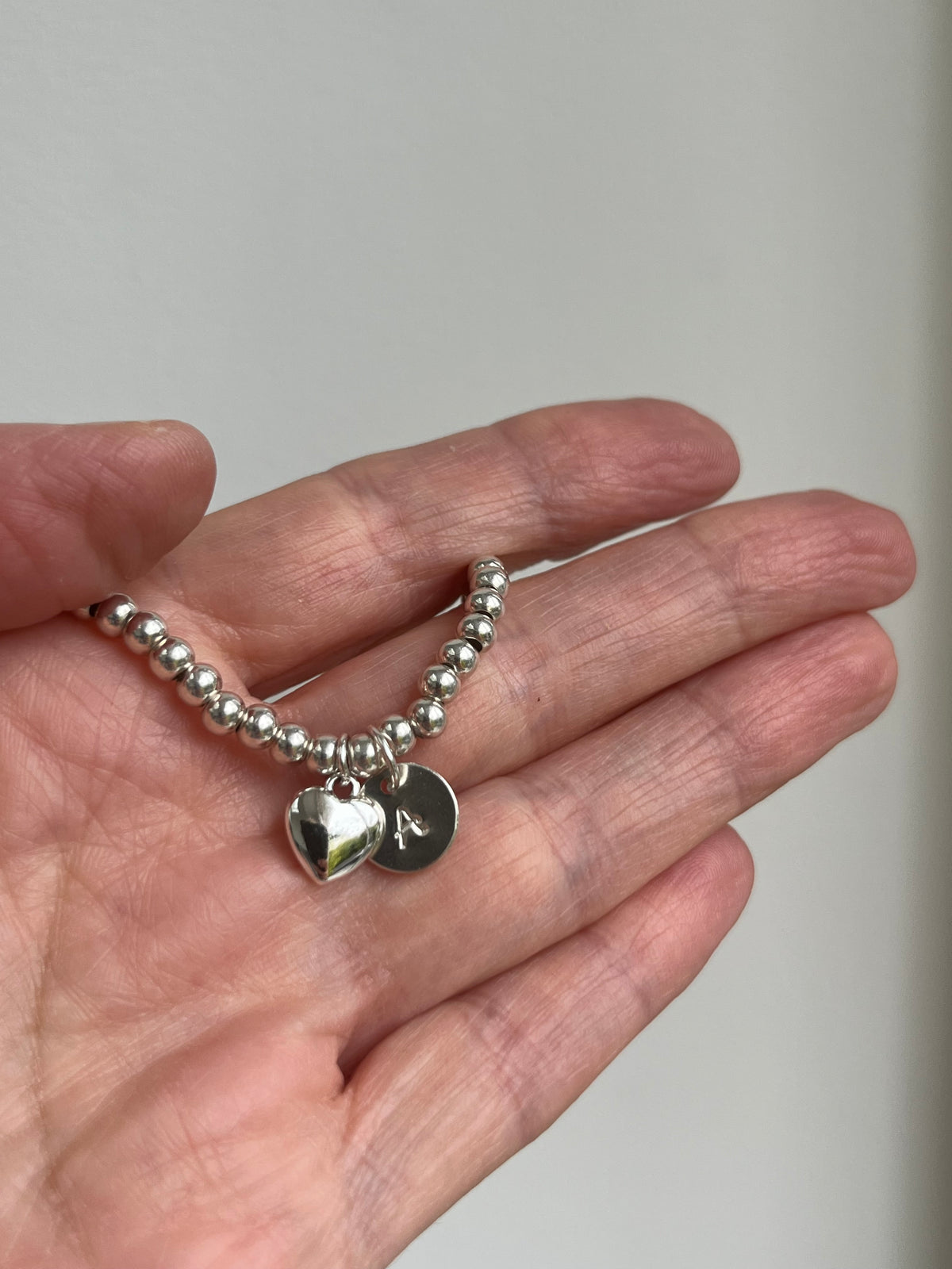 Sterling Silver Bracelet with Initial Disc and Heart Charm
