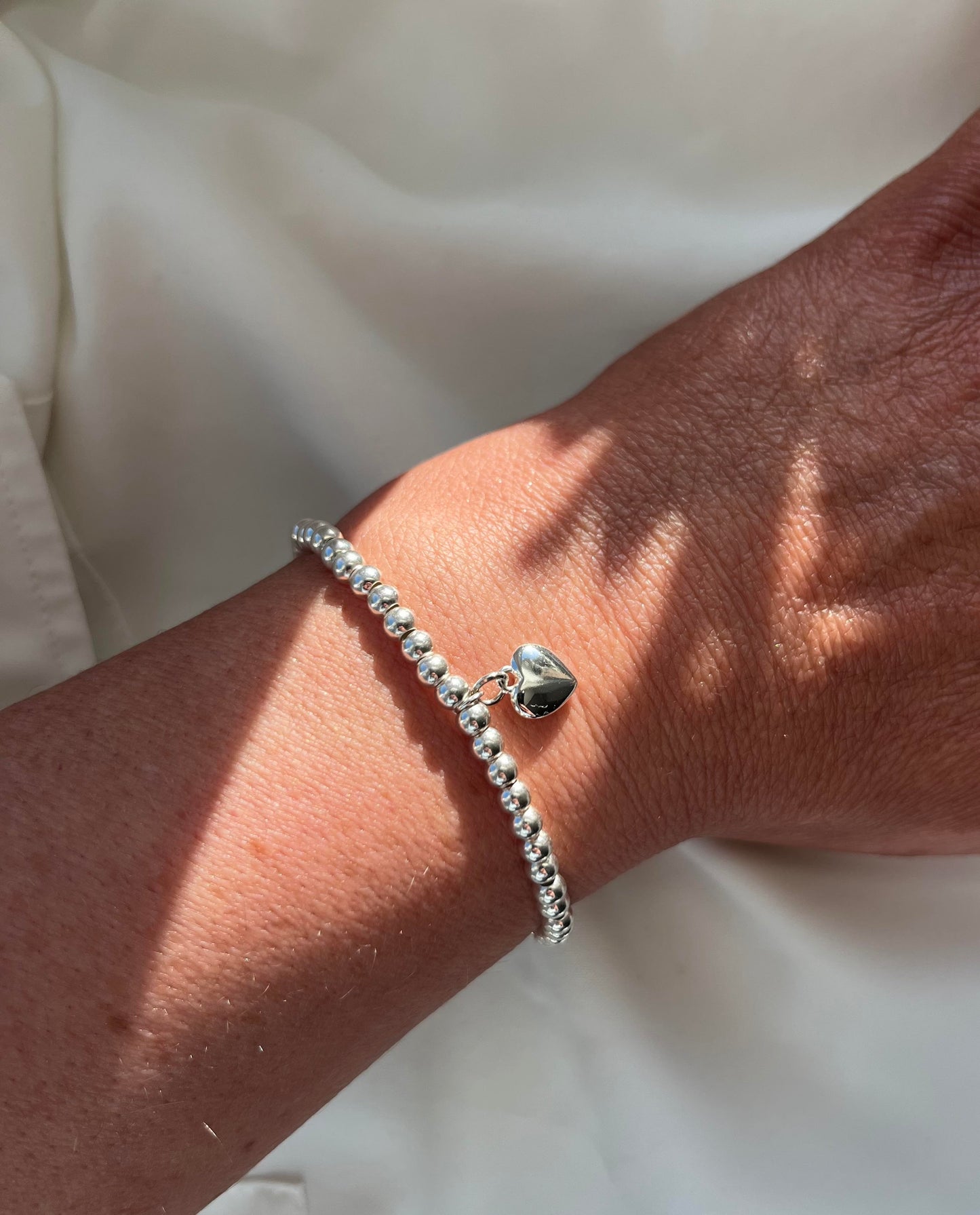 Sterling Silver Beaded Bracelet with Heart Charm